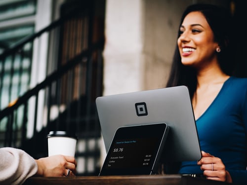 smiling woman working on computer